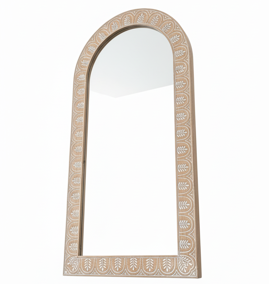 Decorative mirror with an ornate frame on a white background